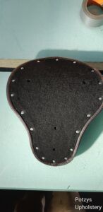 Motorcycle seat bottom recovering