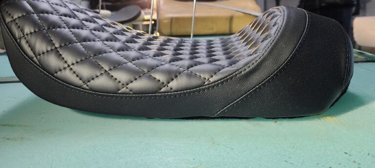 Custom Harley-Davidson seat reshaping motorcycle