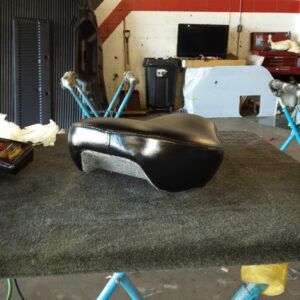 Motorcycle seat pan recovering